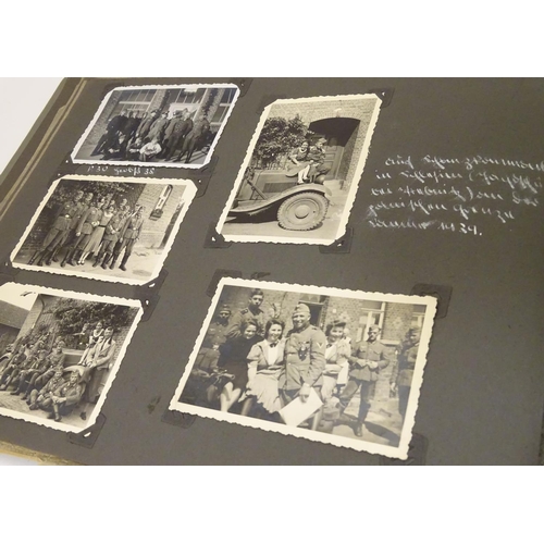 1038 - Militaria: a WWII / World War 2 / Second World War German soldier's photograph album, entitled ' 2. ... 