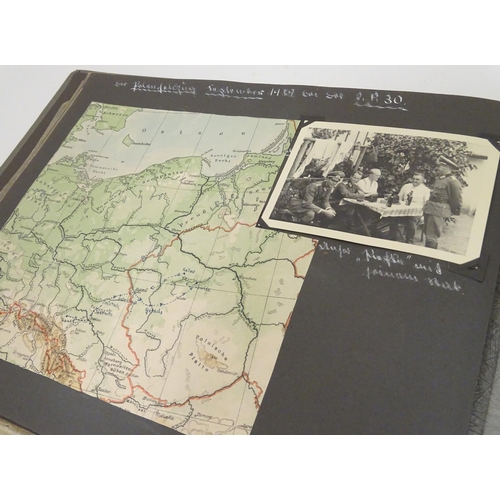 1038 - Militaria: a WWII / World War 2 / Second World War German soldier's photograph album, entitled ' 2. ... 