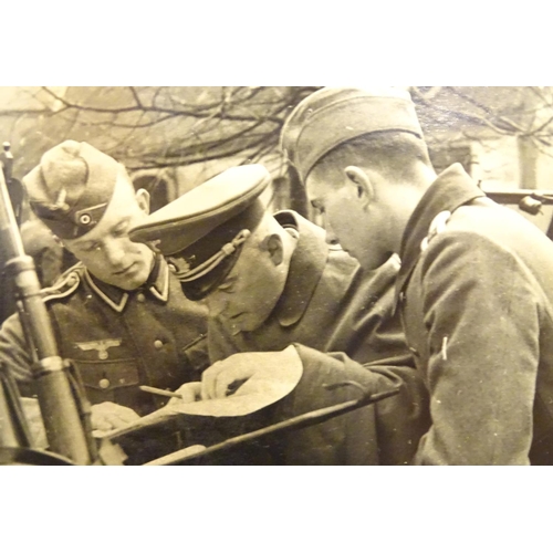 1038 - Militaria: a WWII / World War 2 / Second World War German soldier's photograph album, entitled ' 2. ... 