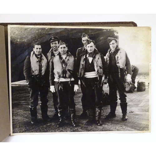 1041 - Militaria: a WWII / Second World War / World War 2 photograph album, containing 61 monochrome photog... 