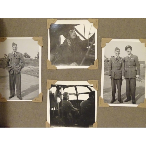 1041 - Militaria: a WWII / Second World War / World War 2 photograph album, containing 61 monochrome photog... 