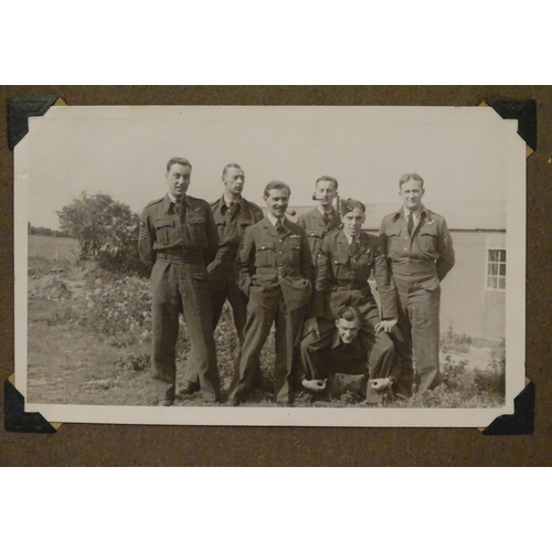 1041 - Militaria: a WWII / Second World War / World War 2 photograph album, containing 61 monochrome photog... 