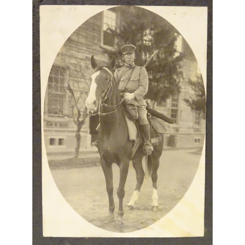 1042 - Militaria: an early 20thC photograph album of a Cavalry soldier of the Imperial Japanese Army, conta... 