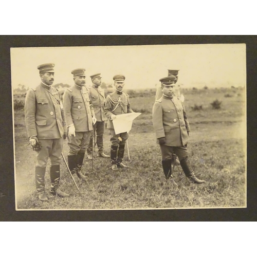 1042 - Militaria: an early 20thC photograph album of a Cavalry soldier of the Imperial Japanese Army, conta... 