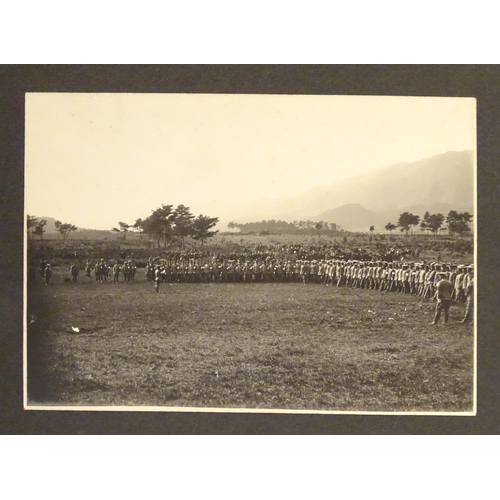 1042 - Militaria: an early 20thC photograph album of a Cavalry soldier of the Imperial Japanese Army, conta... 