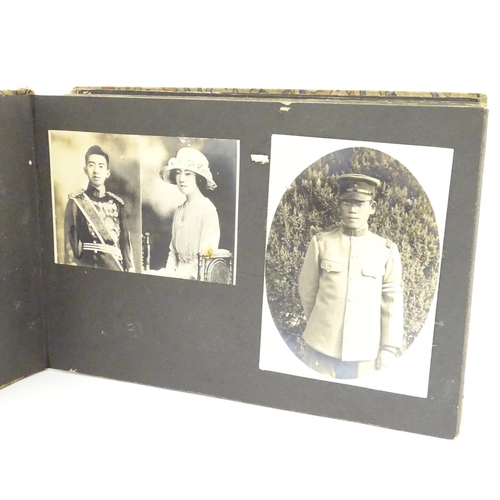 1042 - Militaria: an early 20thC photograph album of a Cavalry soldier of the Imperial Japanese Army, conta... 