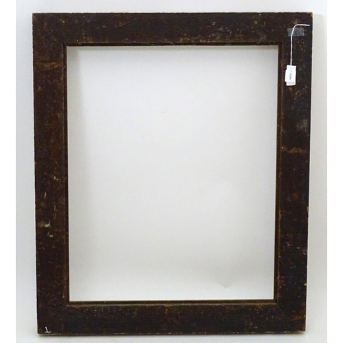 2518 - A 20thC gilt and gesso moulded frame with foliate detail. Approx. 25