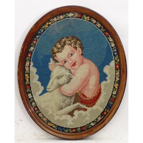 2521 - A 20thC oval needlework / embroidery depicting John the Baptist and a sheep amongst clouds, with a f... 