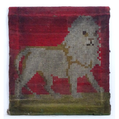 2525 - A Victorian woolwork embroidery with a naive depiction of a lion. Approx. 21