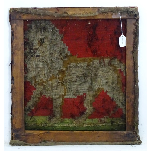 2525 - A Victorian woolwork embroidery with a naive depiction of a lion. Approx. 21