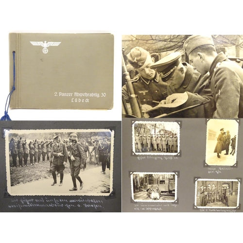 1038 - Militaria: a WWII / World War 2 / Second World War German soldier's photograph album, entitled ' 2. ... 