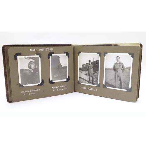 1041 - Militaria: a WWII / Second World War / World War 2 photograph album, containing 61 monochrome photog... 