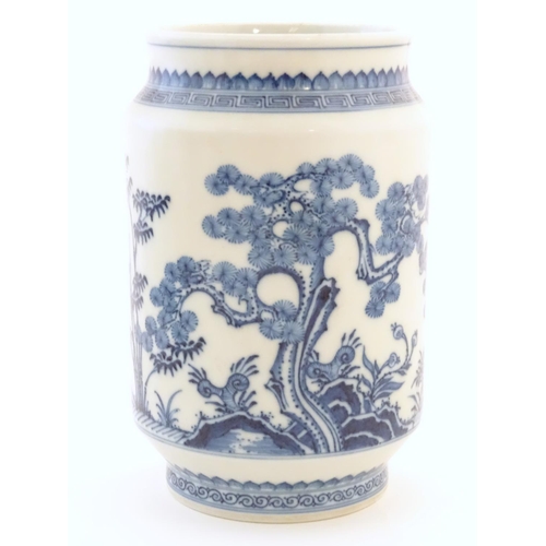 6 - A Chinese blue and white vase of cylindrical form with garden terrace with trees and blossom flowers... 