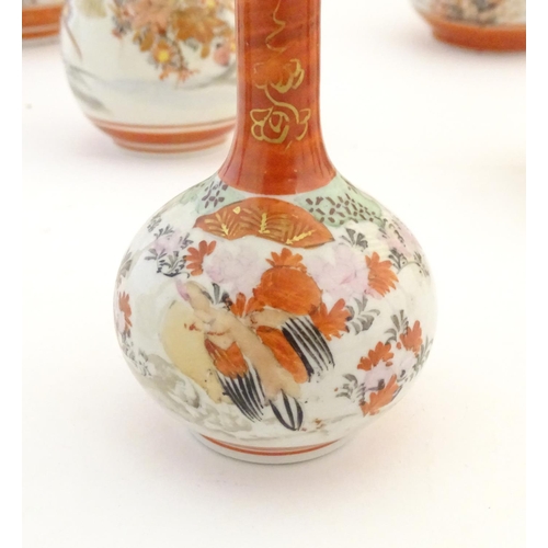 63 - A quantity of Japanese Kutani vases, comprising 12 bottle vases with floral and bird detail, and a t... 