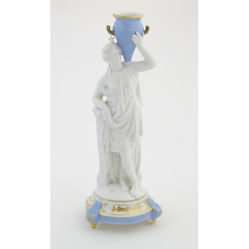 104 - A Continental model of a classical / mythological figure with a star crown, holding a blue twin hand... 