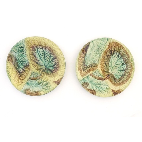 114 - Two majolica Begonia leaf plates of circular form. Approx. 8 1/4