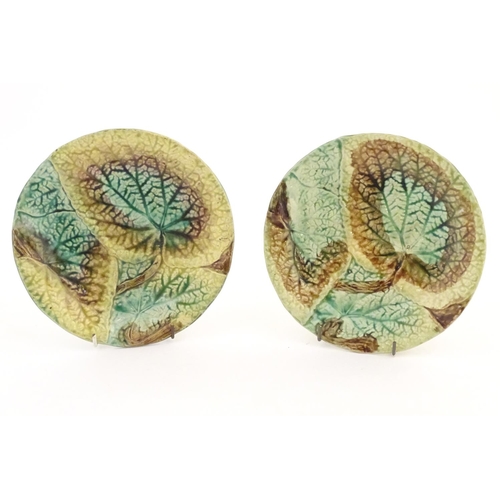 114 - Two majolica Begonia leaf plates of circular form. Approx. 8 1/4