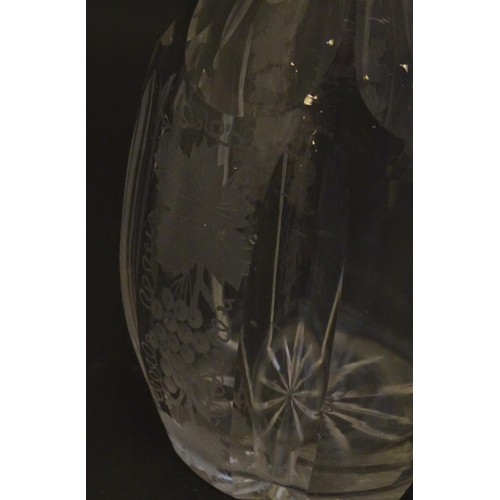 264 - A Victorian glass onion decanter, decorated with fine diamond and pearl string cuts with etched hone... 