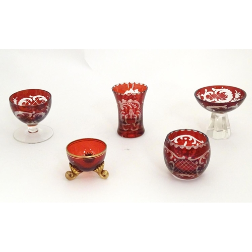 274 - An assortment of Bohemian ruby glass ware, to include salts, pot, liqueur glasses etc, the largest 2... 