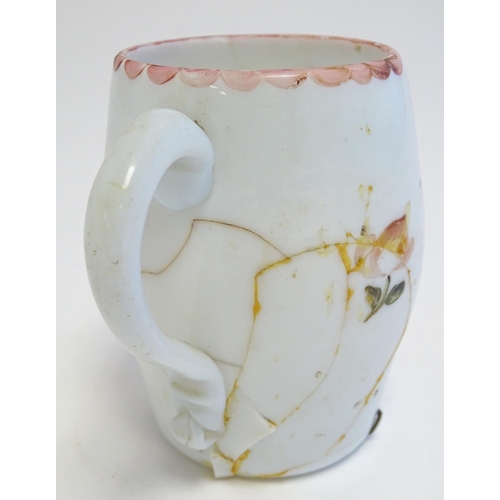 286 - An 18thC milk glass mug with hand painted decoration. 4