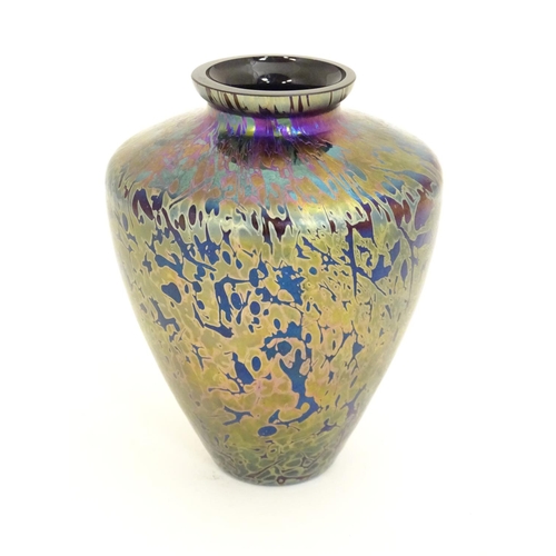 293 - A mid 20thC Royal Brierley Studio art glass vase, of high shouldered tapering form, purple glass wit... 