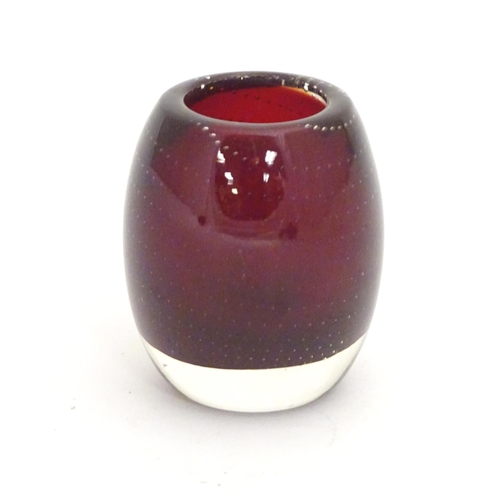 300 - Four mid 20thC art glass items, comprising: a Geoffrey Baxter Whitefriars ruby glass pot, with bubbl... 