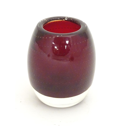 300 - Four mid 20thC art glass items, comprising: a Geoffrey Baxter Whitefriars ruby glass pot, with bubbl... 