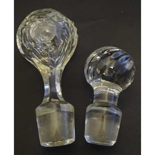 307 - A 19thC pinched crystal decanter, the stopper with swirl decoration, together with a 19thC claret ju... 