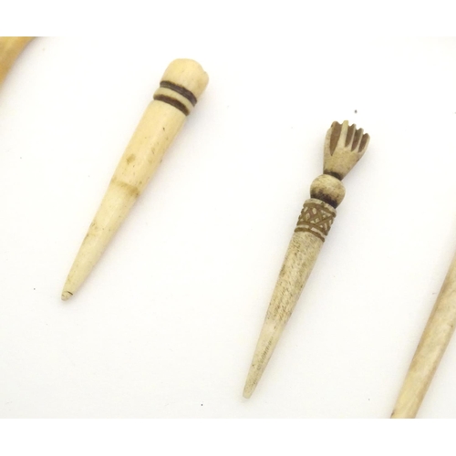 1171 - A quantity of assorted 19thC ivory and bone items to include a manicure tool with nail file, cuticle... 