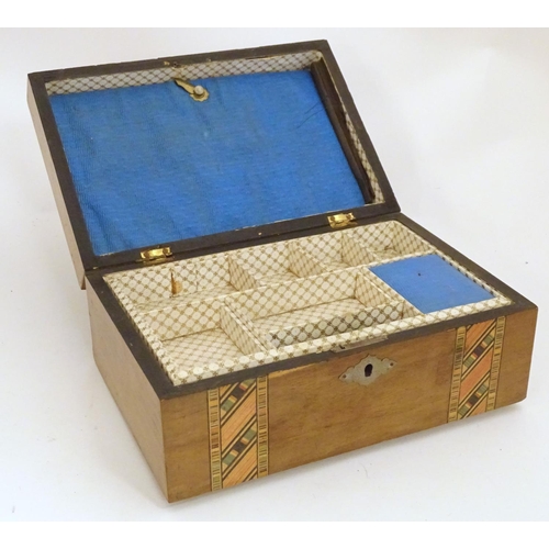 1174 - An early 20thC walnut work box with inlaid stained geometric detail. Approx. 4 1/4