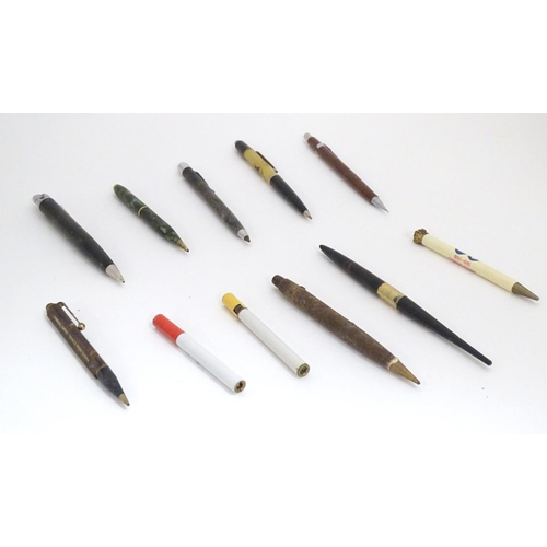 1180 - A quantity of mid 20th pens and propelling pencils, including a King George V and Queen Mary 1910-19... 