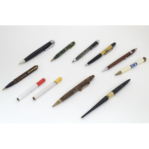 1180 - A quantity of mid 20th pens and propelling pencils, including a King George V and Queen Mary 1910-19... 