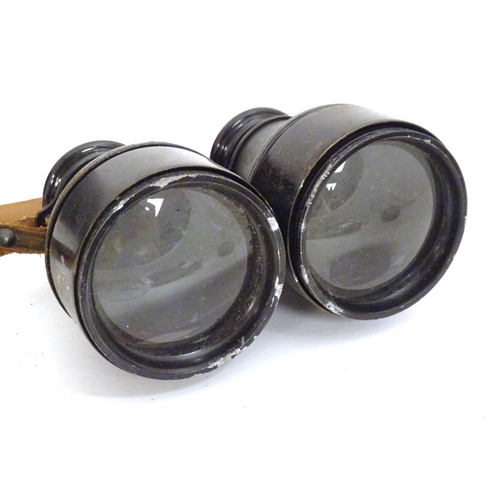 1191 - An early 20thC pair of field binoculars with sun shades, the barrels stamped Iris - Paris , Bull Dog... 