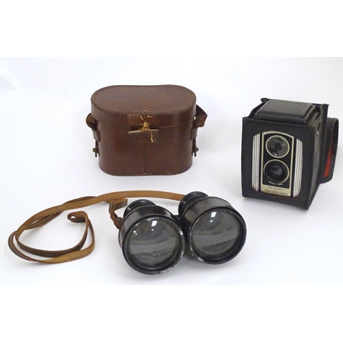 1191 - An early 20thC pair of field binoculars with sun shades, the barrels stamped Iris - Paris , Bull Dog... 