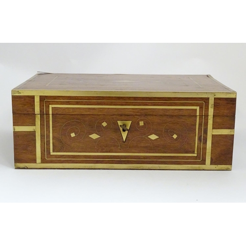 1192 - A Victorian mahogany box with brass banding and scrolling brass inlay. Approx. 4 1/2