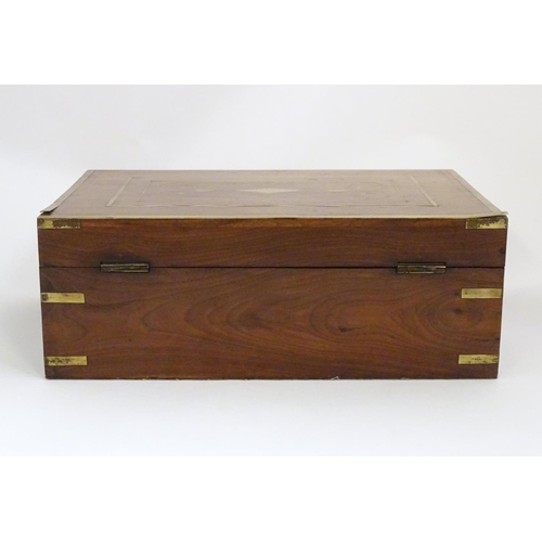 1192 - A Victorian mahogany box with brass banding and scrolling brass inlay. Approx. 4 1/2