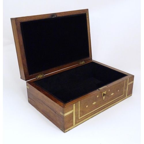 1192 - A Victorian mahogany box with brass banding and scrolling brass inlay. Approx. 4 1/2