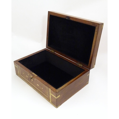 1192 - A Victorian mahogany box with brass banding and scrolling brass inlay. Approx. 4 1/2