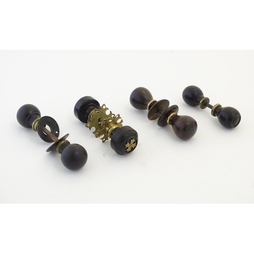 1212 - Four pairs of Victorian ebonised door knobs / handles / door furniture with brass mounts. Largest ap... 