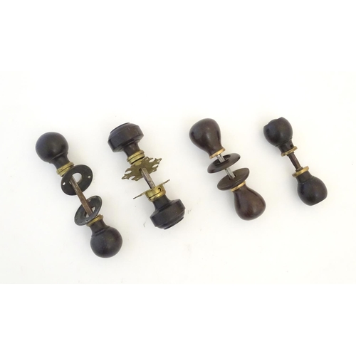 1212 - Four pairs of Victorian ebonised door knobs / handles / door furniture with brass mounts. Largest ap... 