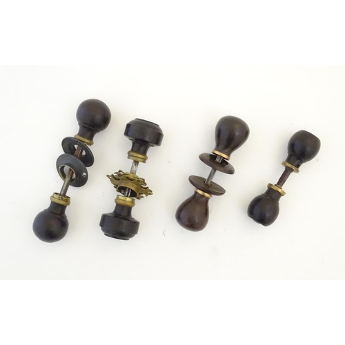 1212 - Four pairs of Victorian ebonised door knobs / handles / door furniture with brass mounts. Largest ap... 