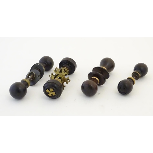 1212 - Four pairs of Victorian ebonised door knobs / handles / door furniture with brass mounts. Largest ap... 