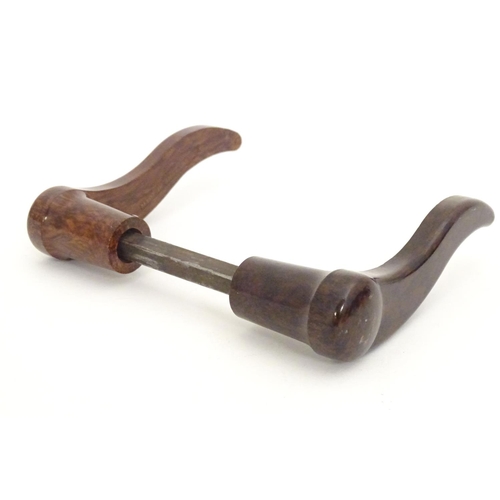 1216 - A pair of 20thC Bakelite lever door handles in mottled brown. Approx. 4 1/2