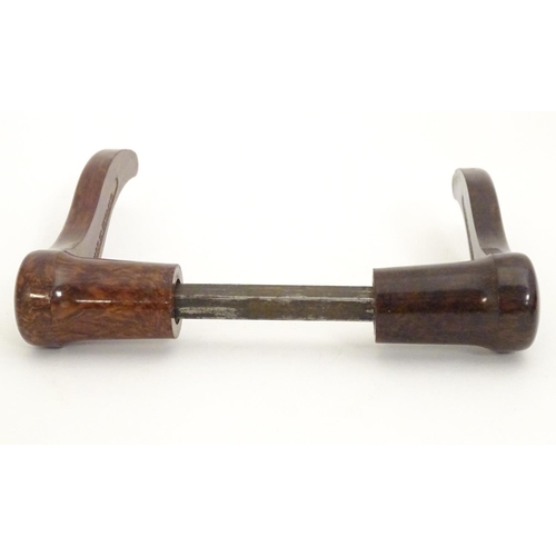 1216 - A pair of 20thC Bakelite lever door handles in mottled brown. Approx. 4 1/2