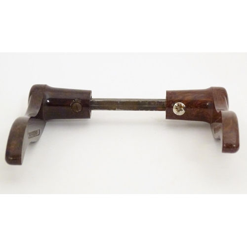 1216 - A pair of 20thC Bakelite lever door handles in mottled brown. Approx. 4 1/2