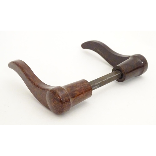 1216 - A pair of 20thC Bakelite lever door handles in mottled brown. Approx. 4 1/2