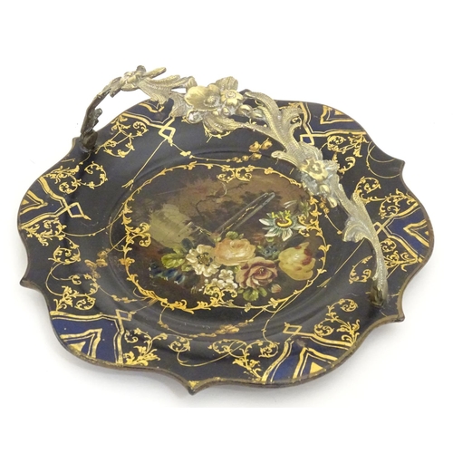 1233 - A Victorian papier mache dish with swing handle with lacquered and painted decoration depicting flow... 