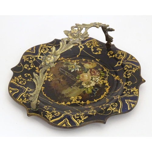 1233 - A Victorian papier mache dish with swing handle with lacquered and painted decoration depicting flow... 