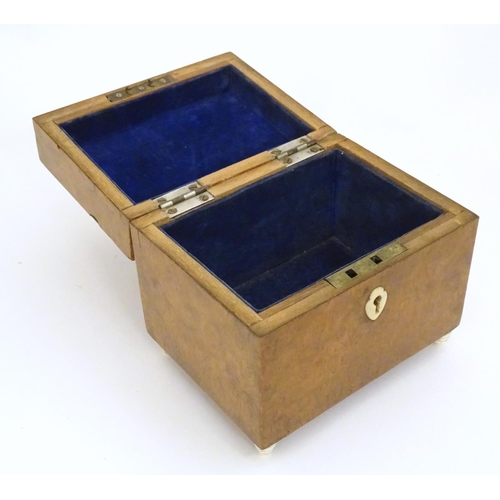 1235 - A late 19th / early 20thC burr walnut box. Approx. 5 1/4