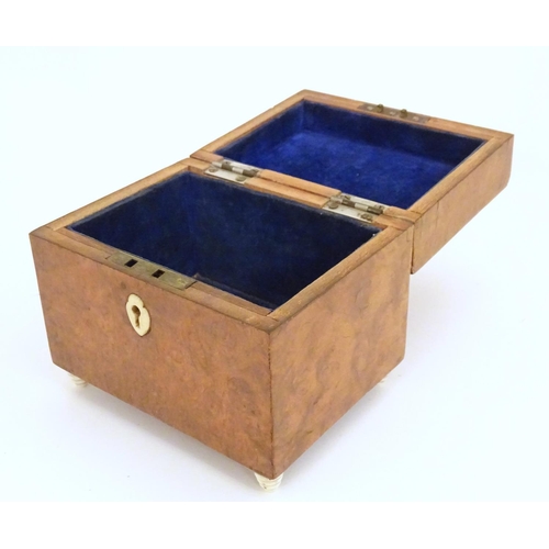 1235 - A late 19th / early 20thC burr walnut box. Approx. 5 1/4